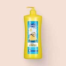Suave Kids Minions 3-in-1 Fresh Fun, yellow bottle, shampoo & body wash, playful Minion graphics.