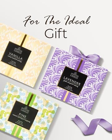 Selection of luxury soy wax candles presented in beautiful packaging boxes.