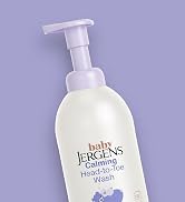 Top half of a bottle of Baby Jergens calming head to toe wash