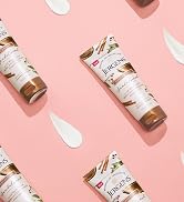 Jergens Sandalwood Body Butter bottles with lotion swatch