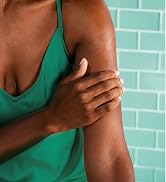 Woman rubbing on Curel Fragrance Free Lotion.