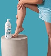 Woman rubbing Curel Itch Defense Lotion on her leg