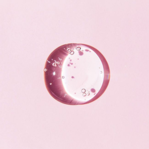 close-up hyaluronic acid on pink background